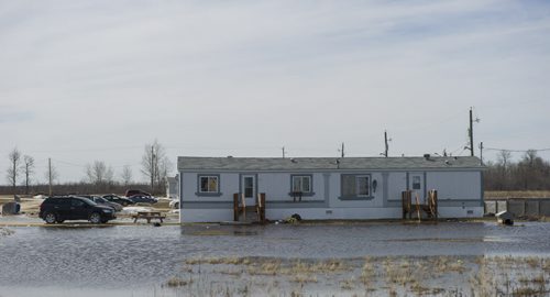 140427 Winnipeg - DAVID LIPNOWSKI / WINNIPEG FREE PRESS (April 27, 2014)  Homes on Peguis First Nation Reserve are still under threat of flooding Sunday April 27, 2014 as the Fisher River spills over its banks.