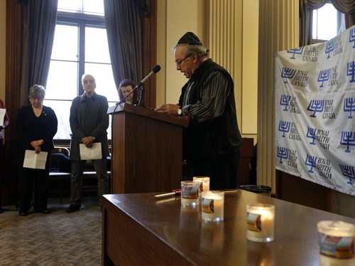 Roger Armbruster of Canada Awakening Ministries  reads names of Holocaust victims at -LOCAL - HOLOCAUST MEMORIAL DAY COMMEMORATION THE LEAGUE FOR HUMAN RIGHTS OF B'NAI BRITH CANADAÄôS "UNTO EVERY PERSON THERE IS A NAME" .ANNUAL HOLOCAUST MEMORIAL DAY COMMEMORATION , Manitoba Legislative Building in Committee Room 254 ,This program, through reflection, poetry, testimony, and the reading of names and origins of victims of the Holocaust, which have been transcribed from the Holocaust Monument on the grounds of the Manitoba Legislature, is intended to drive home the individual nature of the tragedy that befell all victims of the Holocaust, Jewish and non-Jewish alike. It is meant to illustrate the horrible results of hatred and hate- motivated ideology, and to help ensure that such beliefs and principles find no fertile ground here APRIL 28 2014 / KEN GIGLIOTTI / WINNIPEG FREE PRESS