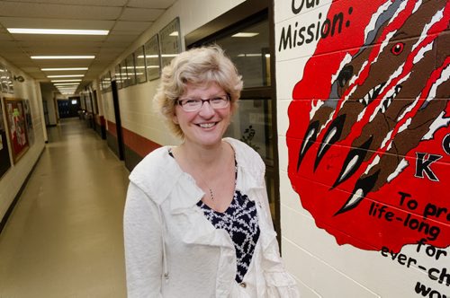 Principal Susan Hayward stands in the hallway of Lundar High School.  The graduation rate in Lakeshore School Division has risen from 50% in 2009 to 92% in 2013. EMILY CUMMING / WINNIPEG FREE PRESS