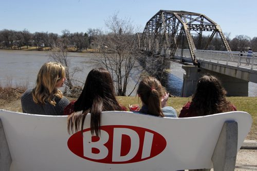 WEATHER STAND UP - A group of University students get together to soak up some sun and  enjoy some ice-cream at BDI on Jubilee Ave. BORIS MINKEVICH / WINNIPEG FREE PRESS April 29, 2014