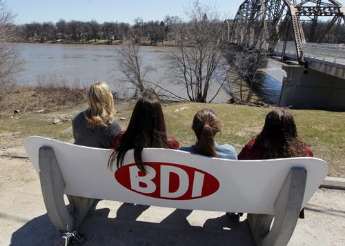 WEATHER STAND UP - A group of University students get together to soak up some sun and  enjoy some ice-cream at BDI on Jubilee Ave. BORIS MINKEVICH / WINNIPEG FREE PRESS April 29, 2014