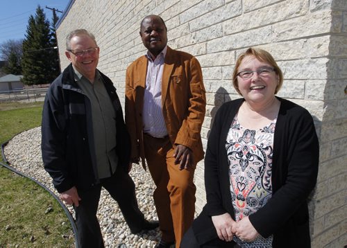 FAITH PAGE - Rev. Larry Ulrich, Bishop Ruben Ngozo of Cameroon, Bishop Elaine Sauer, Synodical bishop. Lutheran bishop from Cameroon visits sister synod in Winnipeg. Location: Anglican Lutheran Centre, 935 Nesbitt Bay in Fort Garry. BORIS MINKEVICH / WINNIPEG FREE PRESS April 29, 2014