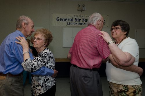 John Grouley and Mary Ostaff (left) and another couple dances at the General Sir Sam Steele Legion on a Wednesday afternoon.  The legion puts on a weekly luncheon and dance.  EMILY CUMMING / WINNIPEG FREE PRESS