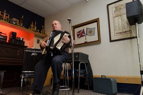 John Parchaliuk plays his accordion for dancers at the General Sir Sam Steele Legion on a Wednesday afternoon.  The legion puts on a weekly luncheon and dance.  EMILY CUMMING / WINNIPEG FREE PRESS