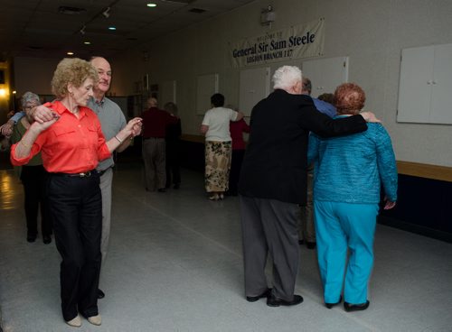 Ray Corlett and Nollia Jolicouer (left) and other couples dance at the General Sir Sam Steele Legion on a Wednesday afternoon.  The legion puts on a weekly luncheon and dance.  EMILY CUMMING / WINNIPEG FREE PRESS