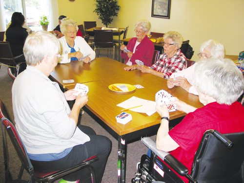 Canstar Community News Sept. 11, 2013 - Members of the Macdonald seniors group try their luck at rummy on Sept. 11 at one of their bi-monthly get-togethers at Mandan Manor in Sanford. (ANDREA GEARY/CANSTAR COMMUNITY NEWS)