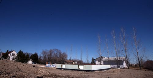 New Housing starts in Woodlands are due to the influx of Plymouth Bretheren membership to the community. May 1, 2014 - (Phil Hossack / Winnipeg Free Press)