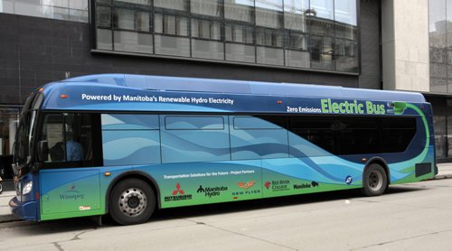 The first made in Manitoba prototype electric transit bus (parked by the Manitoba Hydro Bld.)   Bruce Owen story. Wayne Glowacki / Winnipeg Free Press May2 2014