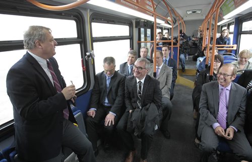 At left, Paul Soubry, president and CEO, New Flyer Industries describes features during tour on the first made in Manitoba prototype electric transit bus.    Bruce Owen story. Wayne Glowacki / Winnipeg Free Press May2 2014