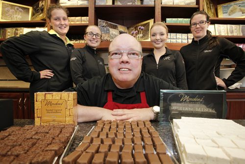 May 3, 2014 - 140503  - Fred Morden, owner of Mordens' of Winnipeg, a chocolatier who is celebrating the company's 55 anniversary is photographed with some of his staff (L to R) Hannah, Alanna, Mariel and Tiffaney in his Sargent Avenue store Saturday, May 3, 2014. John Woods / Winnipeg Free Press