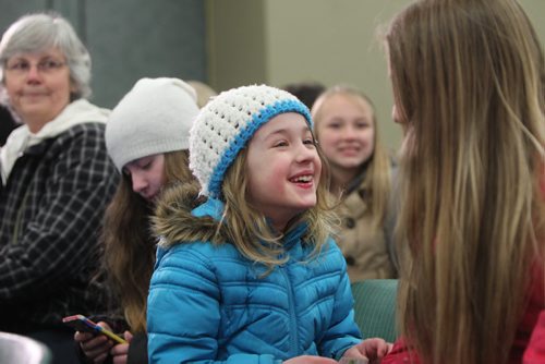 NEXT STAR AUDITIONS  Eight year old Amira Smith (Hat) is all smiles as she waits with her friend Mckenzie Smith - 11 years, to audition with hundreds of kids at RBC Convention Centre for the Next Star Auditions competition Saturday..    May 03, 2014 Ruth Bonneville / Winnipeg Free Pres