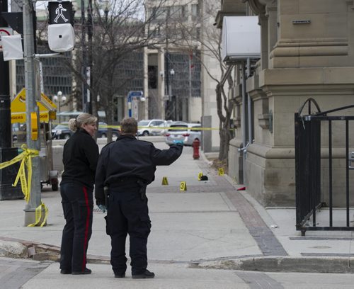 140504 Winnipeg - DAVID LIPNOWSKI / WINNIPEG FREE PRESS (May 04, 2014)  Members of the Winnipeg Police Service were on the scene of a homicide outside of Opera Ultralounge on Main Street Sunday morning.