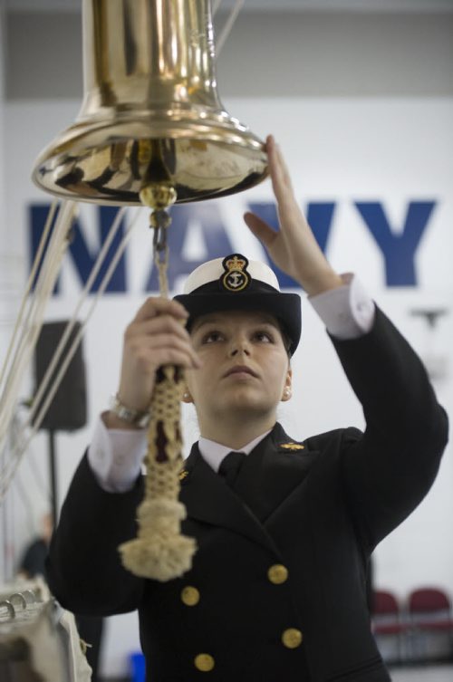 140504 Winnipeg - DAVID LIPNOWSKI / WINNIPEG FREE PRESS (May 04, 2014)  Leading Seaman Dani Schultz rings a bell during the Battle of the Atlantic commemoration ceremony Sunday morning at the HMCS CHIPPAWA.