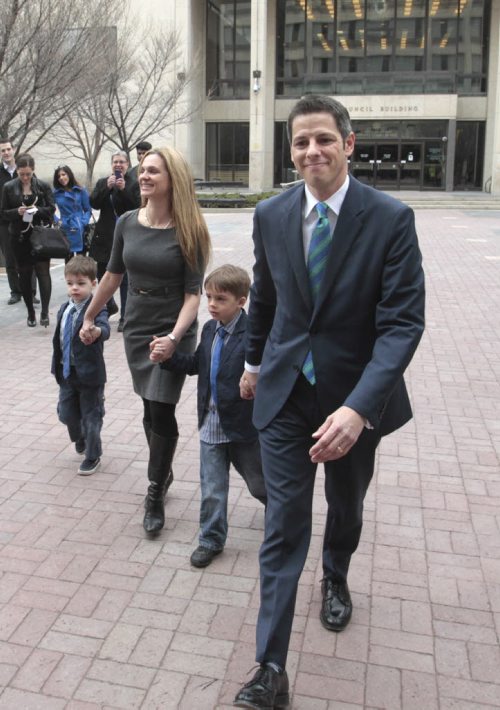 Brian Bowman with his wife Tracy and sons  Austin, left and Hayden arrive at City Hall Tuesday,  Brian registered as a mayoral candidate . Aldo Santin story  Wayne Glowacki / Winnipeg Free Press May 6 2014