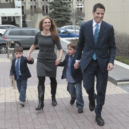 Brian Bowman with his wife Tracy and sons  Austin, left and Hayden arrive at City Hall Tuesday  as Brian registered to be a mayoral candidate . Aldo Santin story  Wayne Glowacki / Winnipeg Free Press May 6 2014