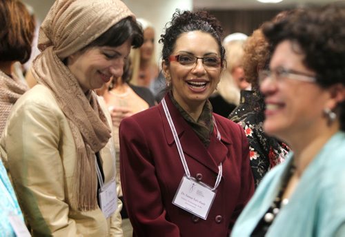 Nominees for the 38th annual YMCA-YWCA Women of Distinction Awards Gala gather together before the event Wednesday evening at the RBC Convention Centre. The event  supports  a variety of our programs that touch the lives of women, youth and children in our city.  Dr. Samar Safi-Harb smiles as gathers with other women in her category before the event  May 07, 2014 Ruth Bonneville / Winnipeg Free Pres