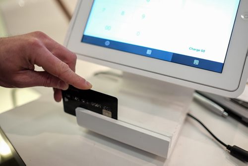 The Square credit card reader is becoming a more popular tool in small business retail circles. There are two versions now, the small original device that plugs into the headphone jack of a smartphone and the newer retail stand that holds an iPad and can be fastened to a table top.  130508 - Thursday, May 08, 2013 -  (MIKE DEAL / WINNIPEG FREE PRESS)