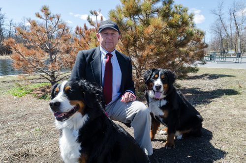 Dr. Brian Joseph stands with his dogs, Annie and Sadie, by the duck pond in Assiniboine Park.  Dr. Joseph's favourite place in Winnipeg is the Winnipeg Humane Society. EMILY CUMMING / WINNIPEG FREE PRESS