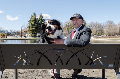Dr. Brian Joseph stands with his dogs, Annie and Sadie, by the duck pond in Assiniboine Park.  Dr. Joseph's favourite place in Winnipeg is the Winnipeg Humane Society. EMILY CUMMING / WINNIPEG FREE PRESS