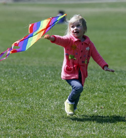 Stdup Weather High + 15  and sunny  , Libby Little age three tries to fly her kite at  Assiniboine Park . May 9 2014 / KEN GIGLIOTTI / WINNIPEG FREE PRESS