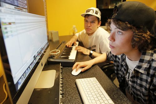 May 10, 2014 - 140510  -  Michael Duggan (L) and Bradey Brown work on an audio mix at Just TV Saturday, May 10, 2014. Just TV at The Broadway Neighbourhood Centre is one of 10 youth-oriented organizations to receive a $100,000 MTS Future First grant John Woods / Winnipeg Free Press