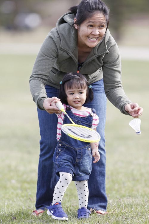 May 10, 2014 - 140510  -  Genelee Delacruz and her daughter  Rylee Chiyo play badminton with dad Rudy at Assiniboine Park Saturday, May 10, 2014.  John Woods / Winnipeg Free Press
