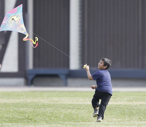 May 10, 2014 - 140510  -  Kian Navea flies a kite at Assiniboine Park Saturday, May 10, 2014.  John Woods / Winnipeg Free Press