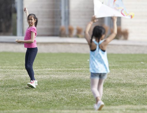 May 10, 2014 - 140510  -  Erich Navea and her sister Iyya fly a kite at Assiniboine Park Saturday, May 10, 2014.  John Woods / Winnipeg Free Press