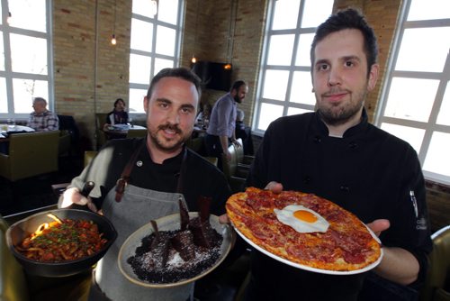 REST REVIEW - CIBO WATERFRONT CAFE. GM/Chef (L) Stephen Pawulski and Chef de Cuisine (R) Matt Le Dorze pose for a photo with some food from the new restaurant. BORIS MINKEVICH / WINNIPEG FREE PRESS  May 9, 2014