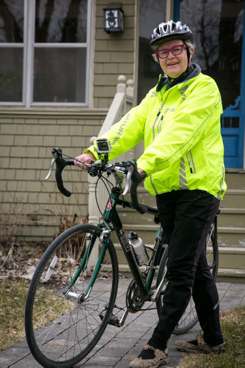 Avid cyclist Bev Peters outside her Wolseley home in Winnipeg. Mary Agnes story on traffic and cyclists 140506 - Tuesday, May 06, 2014 - (Melissa Tait / Winnipeg Free Press)