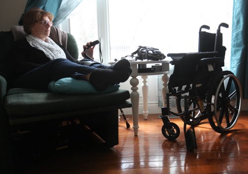 Bev Bungay reclines in her specialized chair with her cane by her side as she slowly recovers from a terrible pedestrian accident 18 months ago, where she broke 11 bones after being hit by a car crossing Portage Ave. See Mary Agnes story.  May 13, 2014 Ruth Bonneville / Winnipeg Free Pres