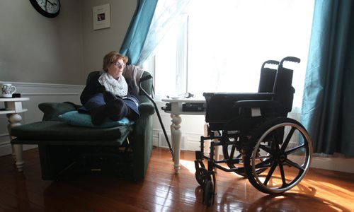 Bev Bungay reclines in her specialized chair with her cane by her side as she slowly recovers from a terrible pedestrian accident 18 months ago, where she broke 11 bones after being hit by a car crossing Portage Ave. See Mary Agnes story.  May 13, 2014 Ruth Bonneville / Winnipeg Free Pres