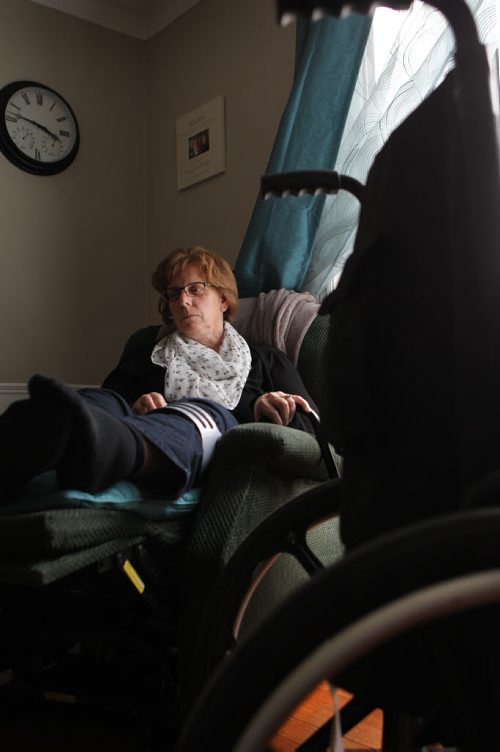 Bev Bungay reclines in her specialized chair with her cane by her side as she slowly recovers from a terrible pedestrian accident 18 months ago, where she broke 11 bones after being hit by a car crossing Portage Ave. See Mary Agnes story.  May 13, 2014 Ruth Bonneville / Winnipeg Free Pres
