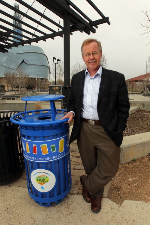 Ken Friesen of CBCRA (Canadian Beverage Container Recycling Association) poses for a photo at the recycling bins at the skateboard park at the Forks. BORIS MINKEVICH / WINNIPEG FREE PRESS  May 13, 2014