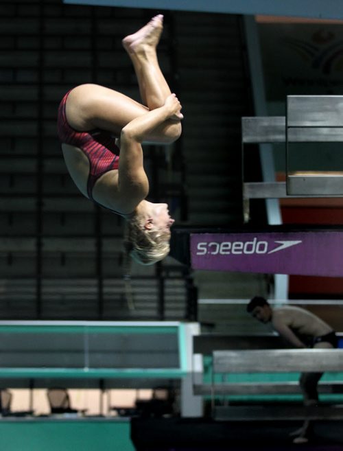 Aimee Harrison, one of the Manitobans competing at the upcoming national senior diving championships this weekend works her spin off the 3 meter board Tuesday. See Melissa Martin's story. May 13, 2014 - (Phil Hossack / Winnipeg Free Press)