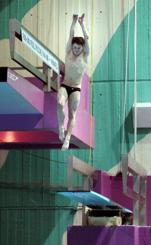 Cam McLean, one of the Manitobans competing at the upcoming national senior diving championships this weekend fine tunes his spring off the 3 meter board Tuesday. See Melissa Martin's story. May 13, 2014 - (Phil Hossack / Winnipeg Free Press)