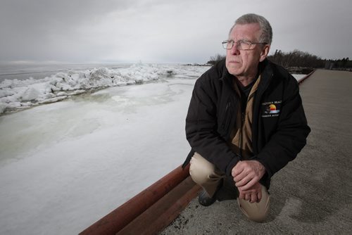 May 13, 2014 - 140513  - Rod Bollman, harbour master with the Victoria Beach Harbour Authority looks over the ice covered Lake Winnipeg. Ice still covers Lake Winnipeg at Victoria Beach Tuesday, May 13, 2014.  John Woods / Winnipeg Free Press