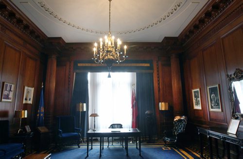The Prince of Wales small plaque on chair awaits royalty in the Blue Room ( pictured) at the Manitoba Legislature. For many years when royalty visits Manitoba they sit in this chair- The chair has small bronze plaques honouring the royals have sat over the years  See  Kevin Rollason  story- May 14, 2014   (JOE BRYKSA / WINNIPEG FREE PRESS)
