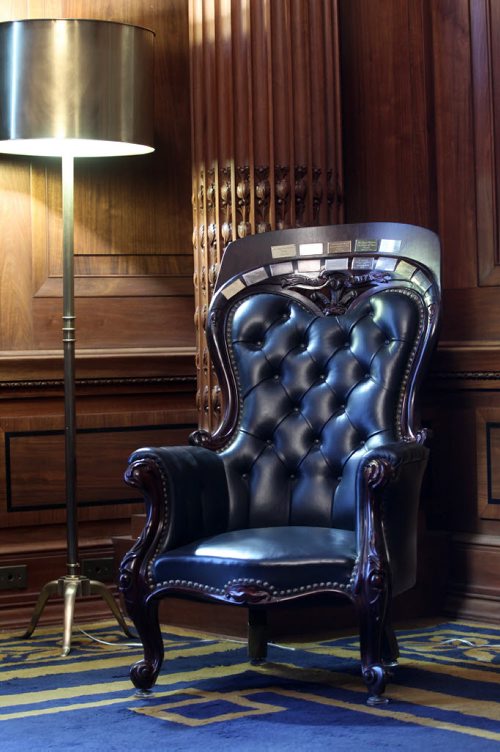 The Prince of Wales chair awaits royalty in the Blue Room at the Manitoba Legislature. For many years when royalty visits Manitoba they sit in this chair- The chair has small bronze plaques honouring the royals have sat over the years  See  Kevin Rollason  story- May 14, 2014   (JOE BRYKSA / WINNIPEG FREE PRESS)