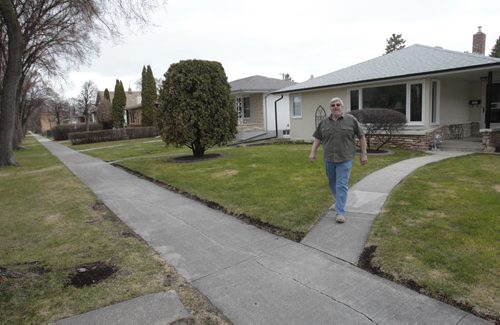 For story on community mailboxes.   Walter Lewin at his home on Perth Ave., community mailboxes might be placed nearby.  Kevin Rollason story Wayne Glowacki / Winnipeg Free Press May 14 2014
