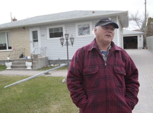 For story on community mailboxes.   Mike Leschyshyn at his home on Arrowwood Dr. South ., community mailboxes might be placed nearby.  Kevin Rollason story Wayne Glowacki / Winnipeg Free Press May 14 2014