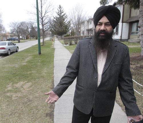 For story on community mailboxes.  Yadvander Singh at his home on Beauty Ave. in the Maples., community mailboxes might be placed nearby.  Kevin Rollason story Wayne Glowacki / Winnipeg Free Press May 14 2014