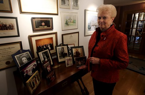 Pearl McGonigal, former Lt. Gov. with various photos from past Royals visits, Wednesday, May 14, 2014. (TREVOR HAGAN/WINNIPEG FREE PRESS)