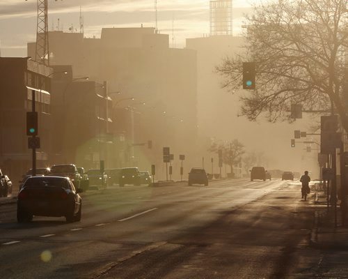 Stdup . Dusty Prairie Town , city street cleaners have cleaned up the heavy  sand left over from winter leaving fine dust kicked up by traffic . A heavy rain should  take that away . May15 2014 / KEN GIGLIOTTI / WINNIPEG FREE PRESS