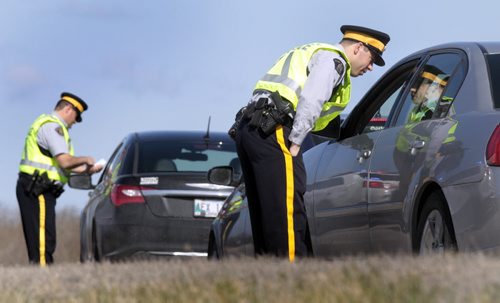On Thursday morning, RCMP East Traffic Services held a Checkstop on the off-ramps from Roblin Bvld. to the Perimeter Hwy. to kick off their increased enforcement for this May long weekend.  The RCMP wants to remind drivers to follow the basic rules, drive sober, slow down, buckle up and leave that cell phone alone. See RCMP news release.  Wayne Glowacki / Winnipeg Free Press May 15 2014