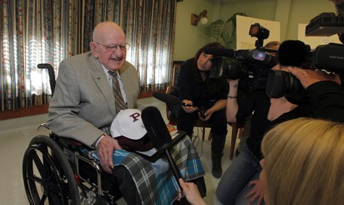 Many media outlets scrum 100 year old Leo D. Flood got his high school degree from St. Paul's Highschool. Presented to him at Misericordia Place. BORIS MINKEVICH / WINNIPEG FREE PRESS  May 15, 2014