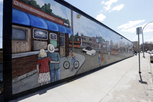 Sunday Xtra St. James Village mural at Portage Ave at Parkview St , depicting long time businesses of the area. Maureen Scurfield story  May15 2014 / KEN GIGLIOTTI / WINNIPEG FREE PRESS
