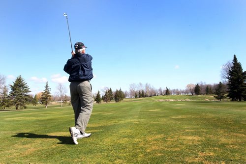 Steinbach, Manitoba The Fly-In Golf Club at 350 Park Rd. East in Steinbach, Manitoba is celebrating their 60th anniversary this year- Gary Nazer hits one on the 6th hole  - See  Tim Campbell story- May 15, 2014   (JOE BRYKSA / WINNIPEG FREE PRESS)