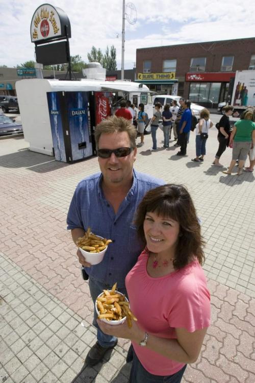 KENORA - Lisa and Rob Bell, owners of Ye Olde Chip Truck, celebrate the French fry trucks 50th anniversary.  Tom Thomsom for Winnipeg Free Press