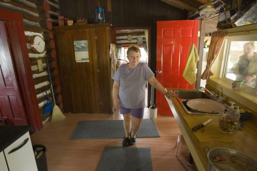 RED DEER KAKE - Merrilee Needham in the kitchen of her 1913 cottage.  Tom Thomsom for Winnipeg Free Press